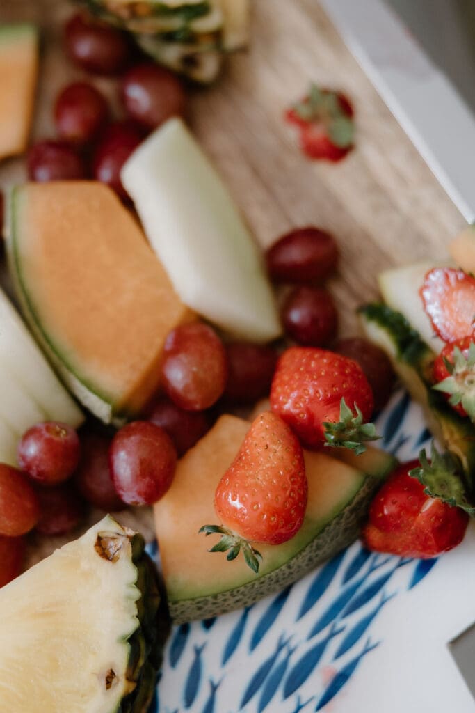 Fresh fruit platter laid out during wedding morning preparations.