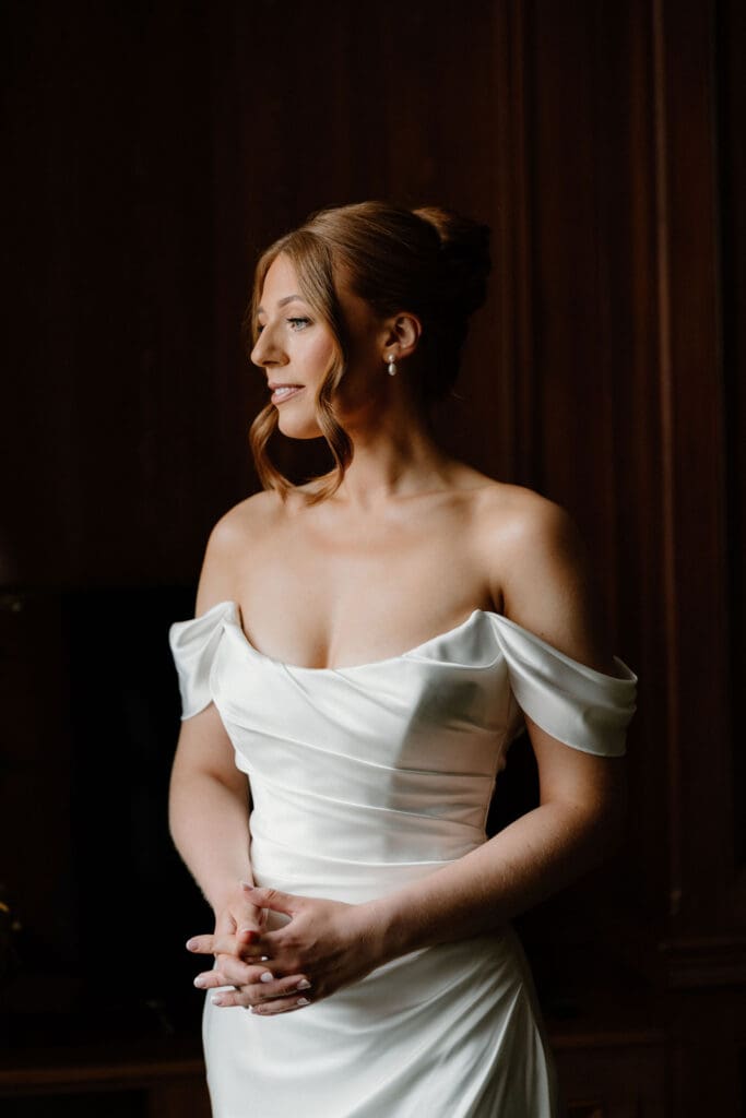 Bride wearing her wedding dress during preparations at The Edinburgh Grand