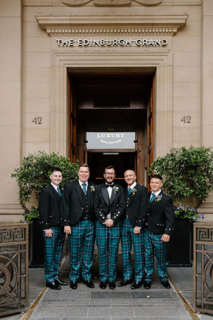 Groom and groomsmen outside The Edinburgh Grand in Edinburgh