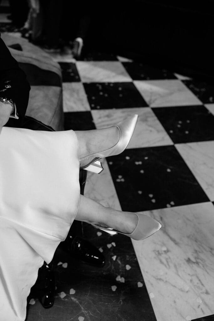 Wedding dress and shoe movement captured during the ceremony at The Edinburgh Grand