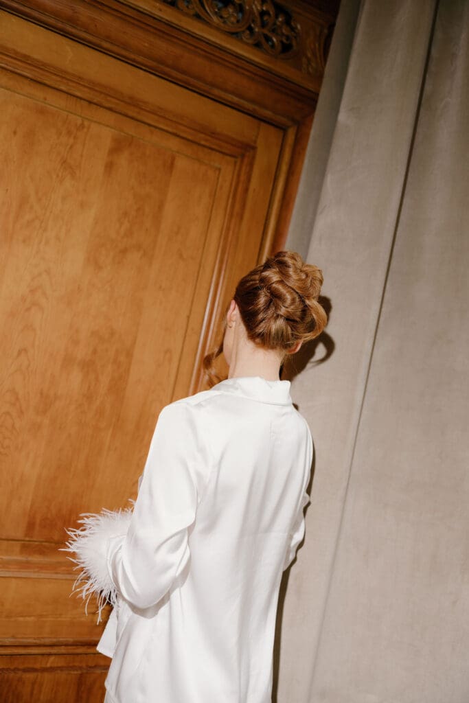 Bride in her wedding robe during morning preparations at The Edinburgh Grand
